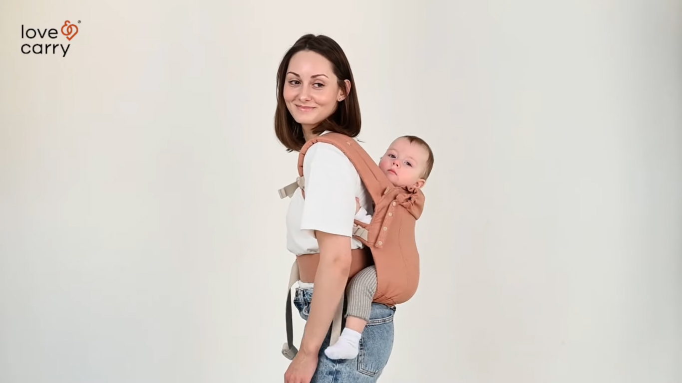 Love & Carry® Primo Baby Carrier. Back carry position: 6 months+