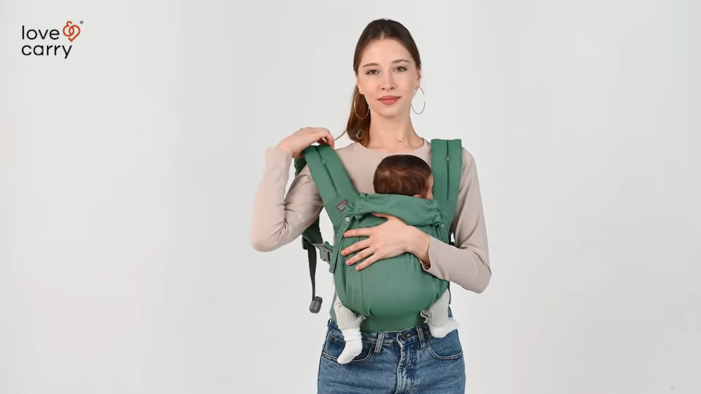 Love & Carry® Primo Baby Carrier. How to take your baby out of the front carry position
